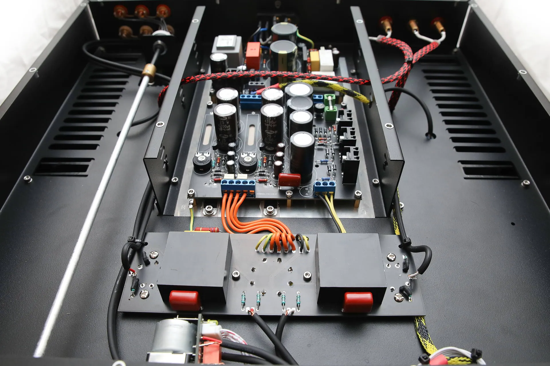 Close view inside the HT-50: the power supply board, capacitors and hand dressed wiring